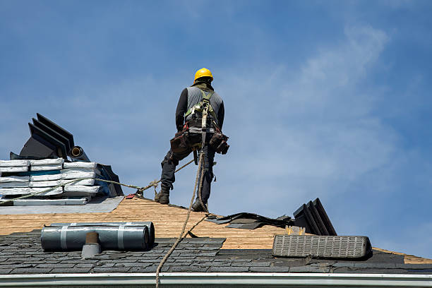Professional Roofing technician working in Littleton, MA